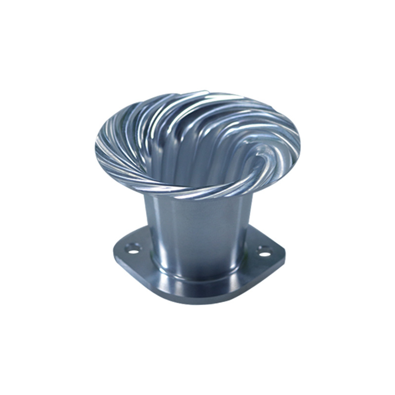 Polished aluminum component showing curved internal features and mounting flange